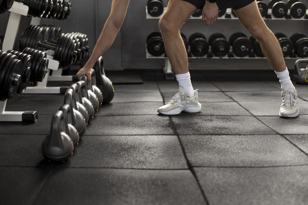 Resilient athletic flooring shock absorbing