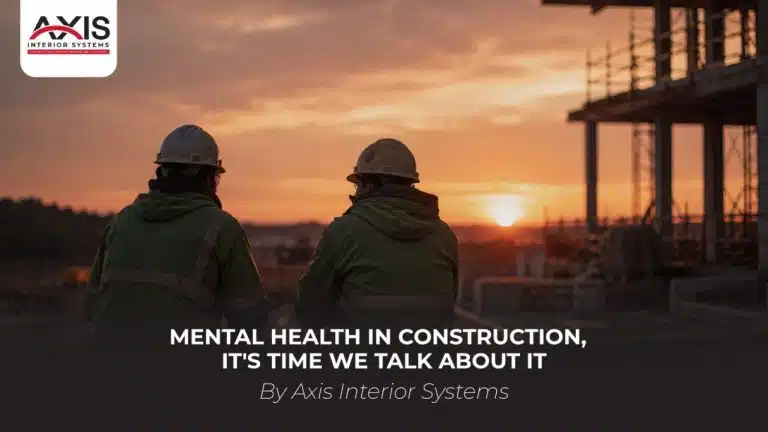 Construction workers at a jobsite during sunset, Axis Interior Systems mental health awareness