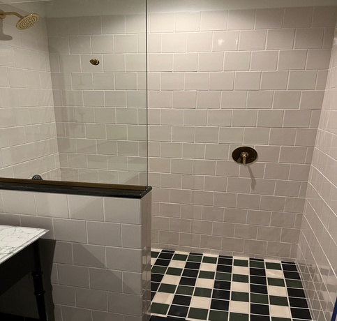 Ceramic tile installation in a commercial shower